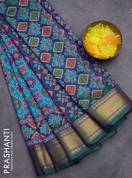 Semi tussar saree cs blue and dual shade of green with allover ikat prints and zari woven border