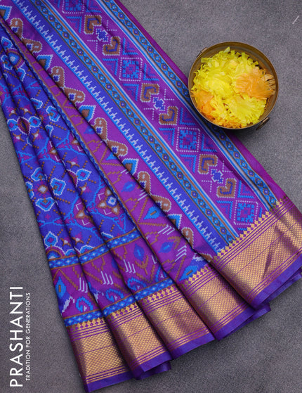 Semi tussar saree blue and purple with allover ikat prints and zari woven border