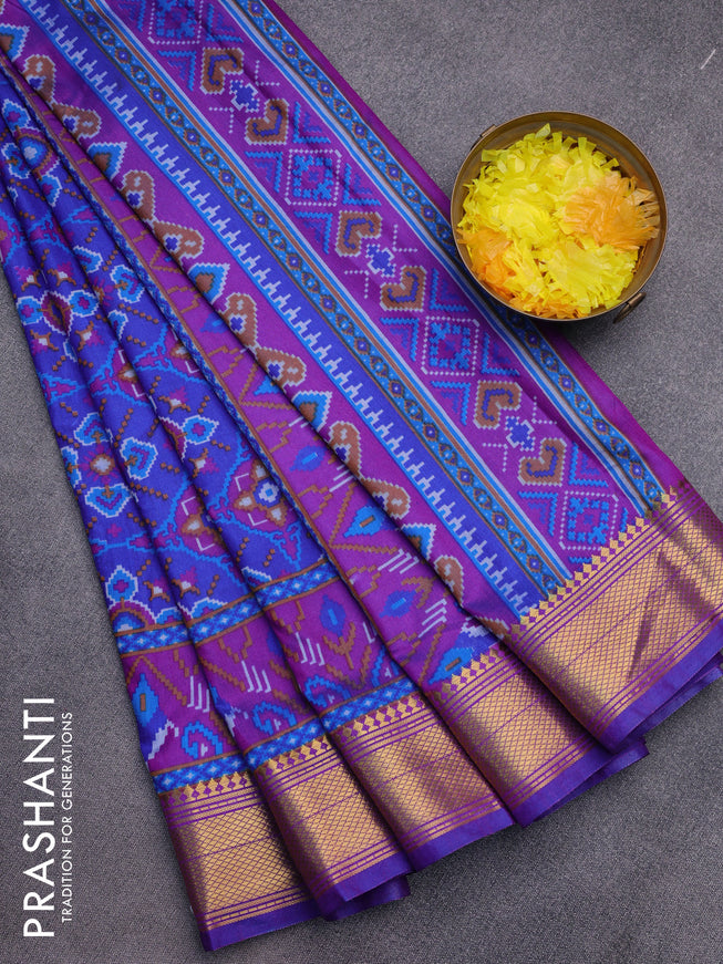 Semi tussar saree blue and purple with allover ikat prints and zari woven border