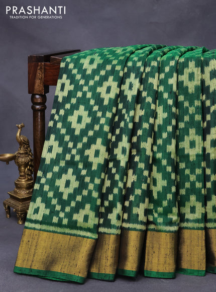 Rajkot patola silk saree green with allover ikat weaves & jute finished and zari woven border