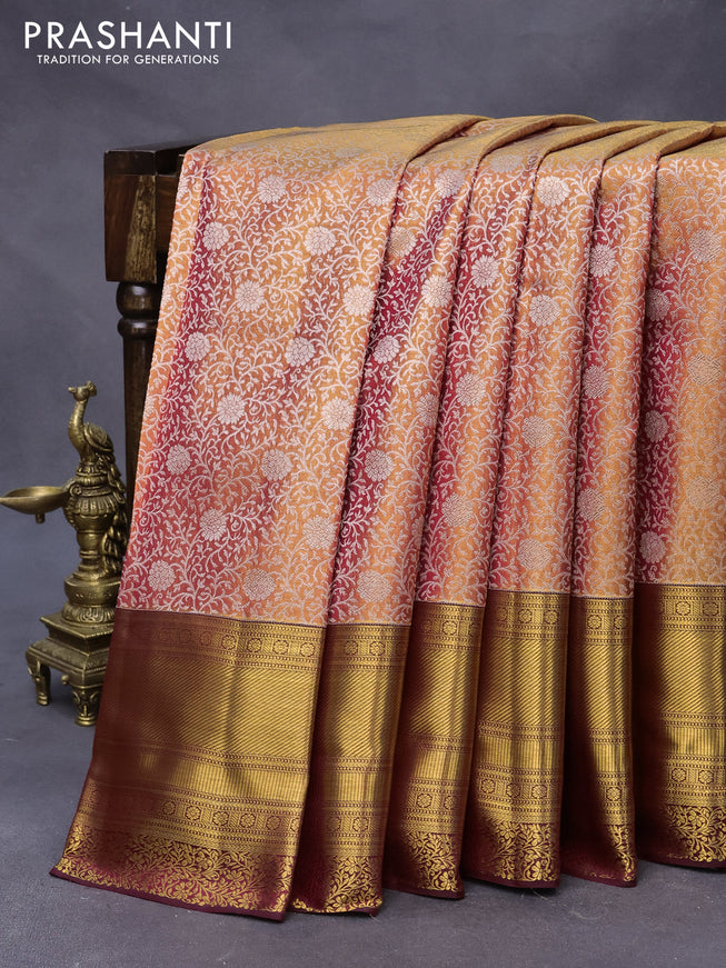 Pure kanjivaram tissue silk saree dual shade of gold and maroon with allover silver zari woven brocade weaves and long zari woven border