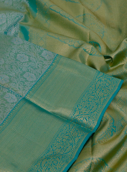 Pure kanjivaram tissue silk saree teal green with allover silver zari woven brocade weaves and zari woven border