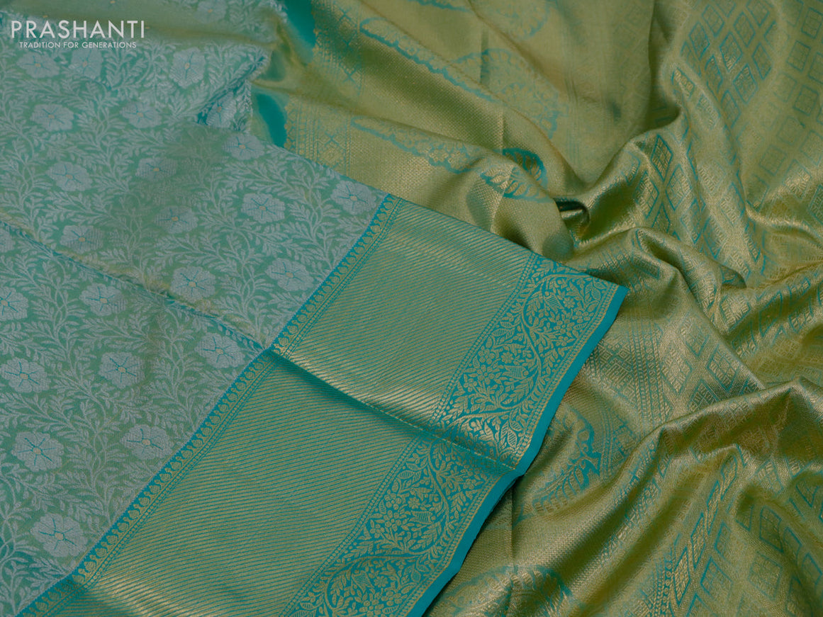 Pure kanjivaram tissue silk saree teal green with allover silver zari woven brocade weaves and zari woven border