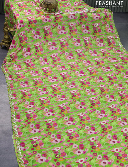 Crepe georgette silk saree light green with allover floral prints & embroidery work buttas and aari work border