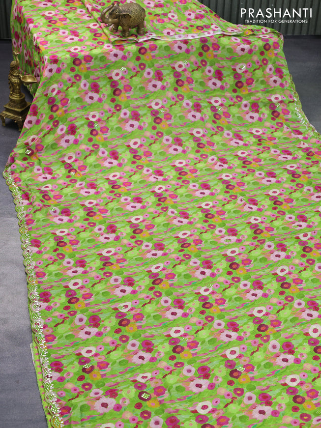 Crepe georgette silk saree light green with allover floral prints & embroidery work buttas and aari work border