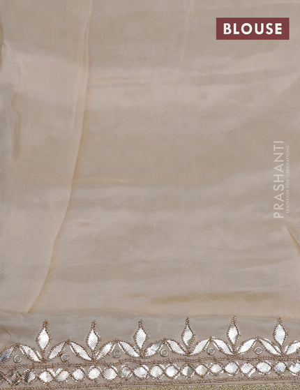 Banarasi silk saree cream with allover zari weaves and zari woven gottapatti lace work border