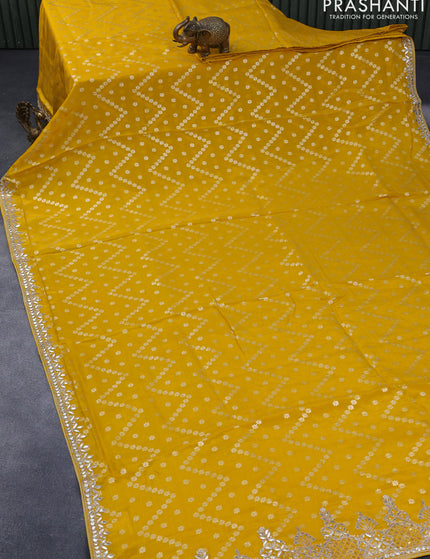 Banarasi silk saree yellow with allover zari weaves and zari woven gottapatti lace work border