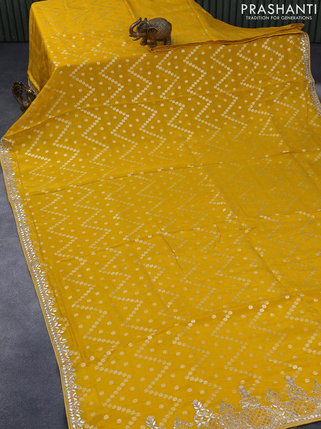 Banarasi silk saree yellow with allover zari weaves and zari woven gottapatti lace work border