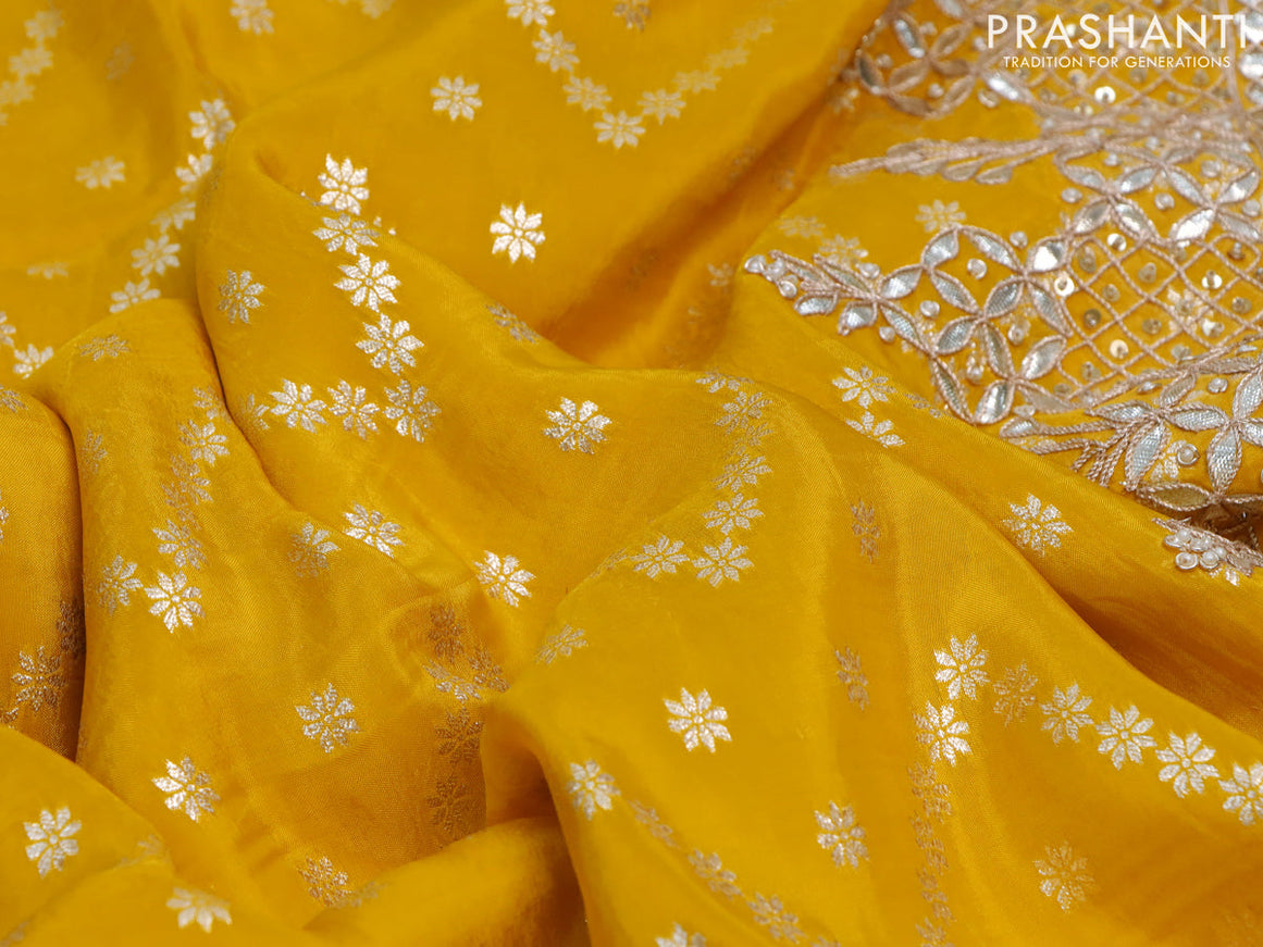 Banarasi silk saree yellow with allover zari weaves and zari woven gottapatti lace work border