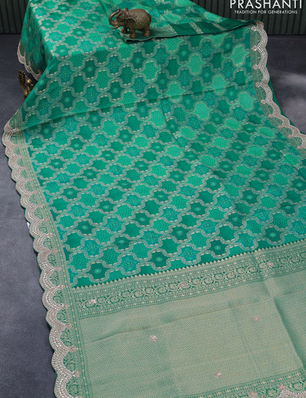 Georgette silk saree teal green with allover zari woven banarasi weaves and zari woven gottapatti lace work border