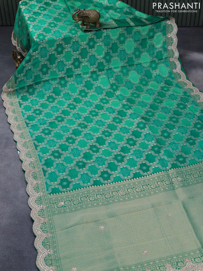 Georgette silk saree teal green with allover zari woven banarasi weaves and zari woven gottapatti lace work border