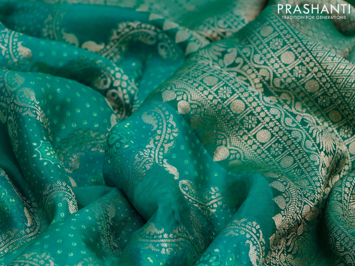 Georgette silk saree teal green with allover zari woven banarasi weaves and zari woven gottapatti lace work border