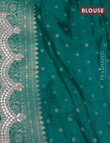 Georgette silk saree teal green with allover zari woven banarasi weaves and zari woven gottapatti lace work border