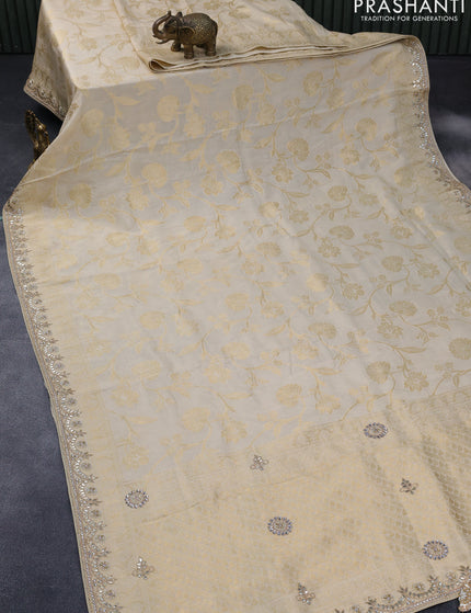 Banarasi silk saree cream with allover zari woven banarasi weaves and zari woven gottapatti lace work border