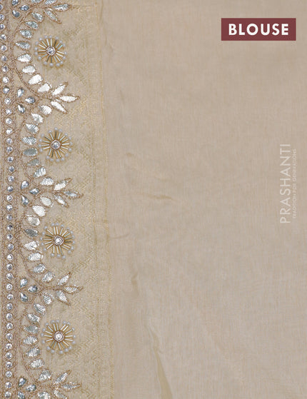 Banarasi silk saree cream with allover zari woven banarasi weaves and zari woven gottapatti lace work border