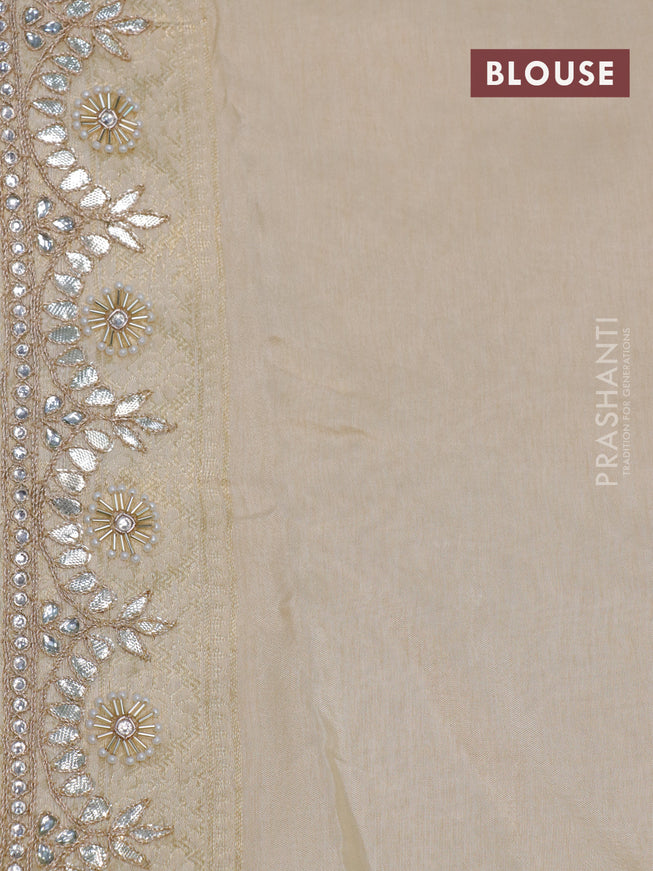 Banarasi silk saree cream with allover zari woven banarasi weaves and zari woven gottapatti lace work border