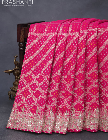 Georgette silk saree pink with allover bandhani prints & banarasi zari weaves and zari woven gottapatti lace work border