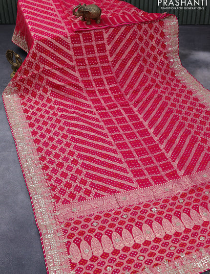 Georgette silk saree pink with allover bandhani prints & banarasi zari weaves and zari woven gottapatti lace work border