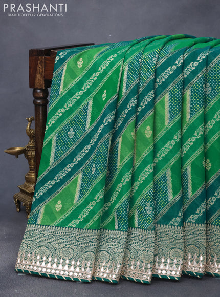 Georgette silk saree green and teal green with allover zari woven banarasi weaves and zari woven gottapatti lace work border