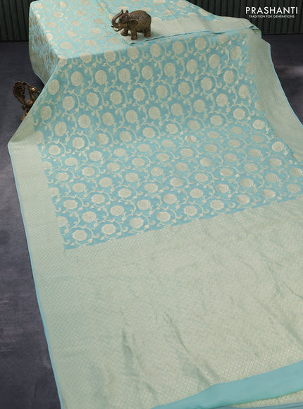 Banarasi georgette silk saree pastel blue with allover thread & floral zari weaves and woven border