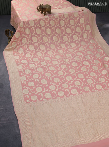 Banarasi georgette silk saree peach pink with allover thread & floral zari weaves and woven border