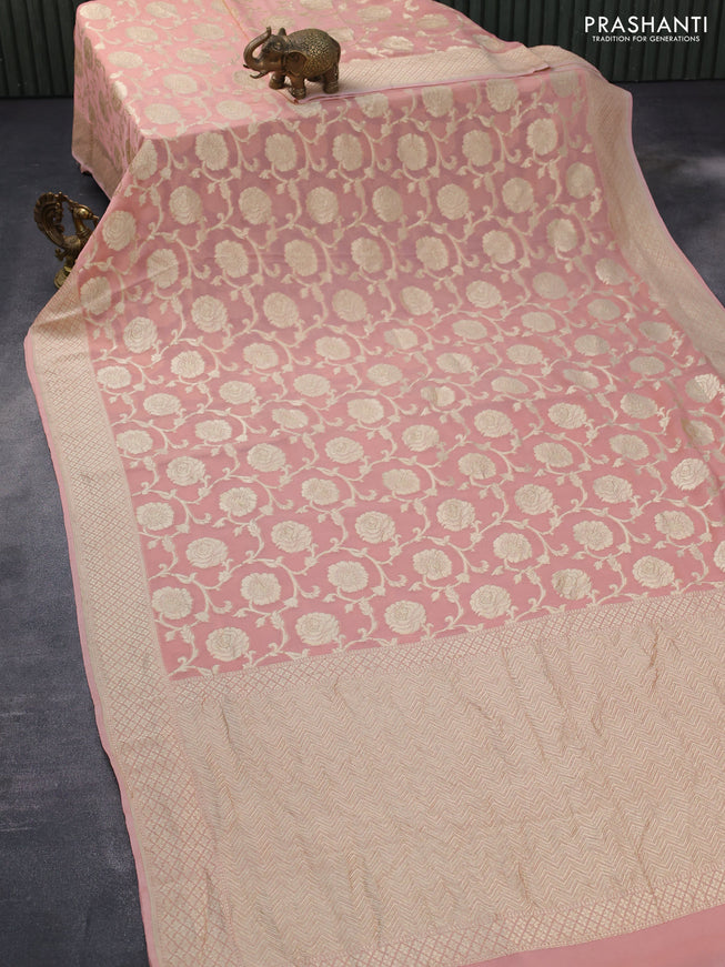 Banarasi georgette silk saree peach pink with allover thread & floral zari weaves and woven border