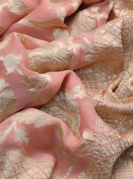 Banarasi georgette silk saree peach pink with allover thread & floral zari weaves and woven border