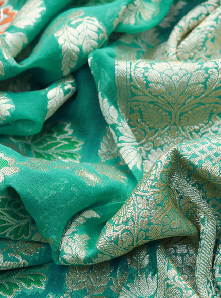 Banarasi georgette silk saree teal blue with allover floral design thread & zari weaves and woven border