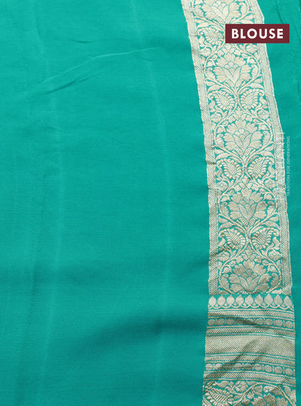 Banarasi georgette silk saree teal blue with allover floral design thread & zari weaves and woven border