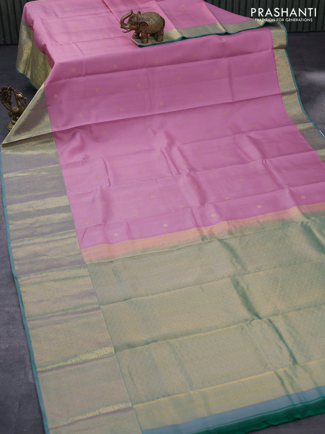 Pure kanjivaram silk saree light pink and dual shade of green with zari woven buttas and long rich zari woven border