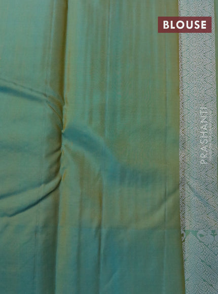 Pure kanjivaram silk saree mango yellow and dual shade of teal blue with allover silver zari weaves and silver zari woven border