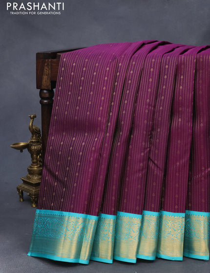 Pure kanjivaram silk saree deep purple and teal blue with allover zari weaves and zari woven korvai border