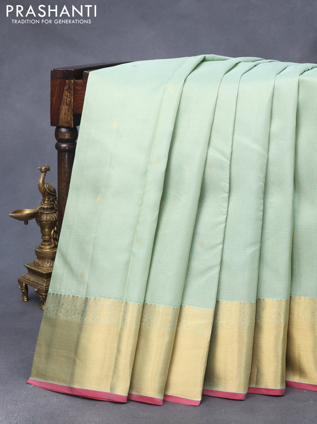 Pure kanjivaram silk saree pastel green and pink with allover small zari checks & buttas and zari woven border