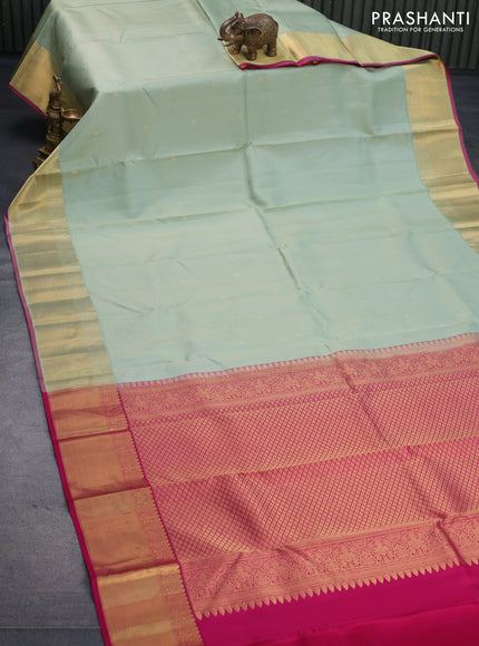 Pure kanjivaram silk saree pastel green and pink with allover small zari checks & buttas and zari woven border