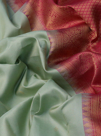 Pure kanjivaram silk saree pastel green and pink with allover small zari checks & buttas and zari woven border