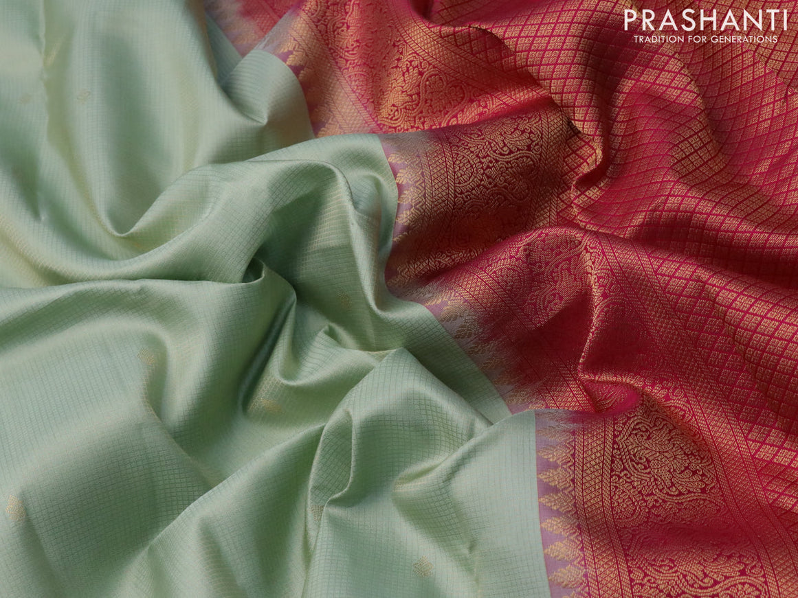 Pure kanjivaram silk saree pastel green and pink with allover small zari checks & buttas and zari woven border