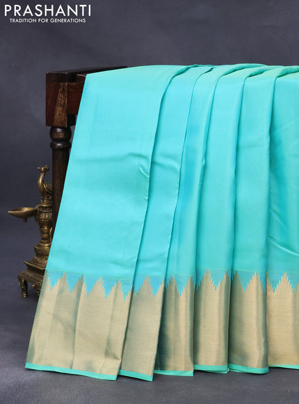 Pure kanjivaram silk saree teal blue with plain body and temple design zari woven border