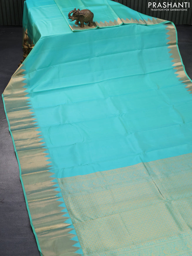 Pure kanjivaram silk saree teal blue with plain body and temple design zari woven border