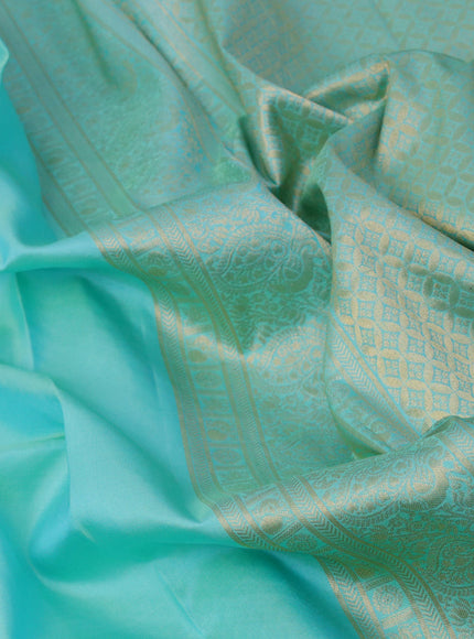 Pure kanjivaram silk saree teal blue with plain body and temple design zari woven border