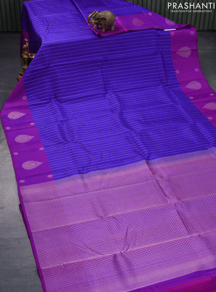 Pure kanjivaram silk saree blue and purple with allover zari weaves and zari woven butta border