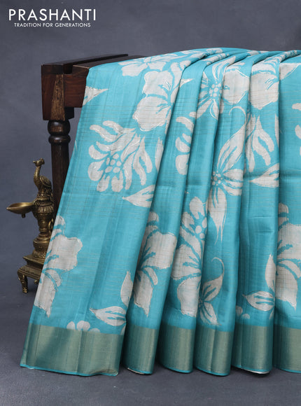 Semi matka foil printed saree teal blue with allover floral prints & zari weaves and zari woven border