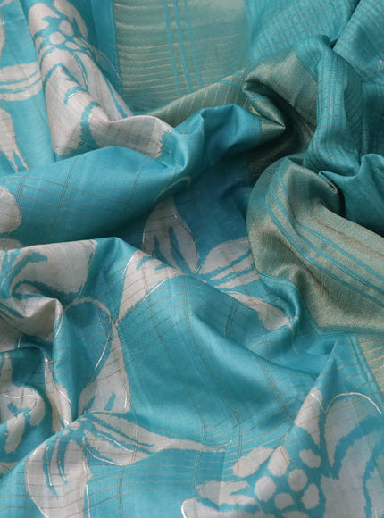 Semi matka foil printed saree teal blue with allover floral prints & zari weaves and zari woven border