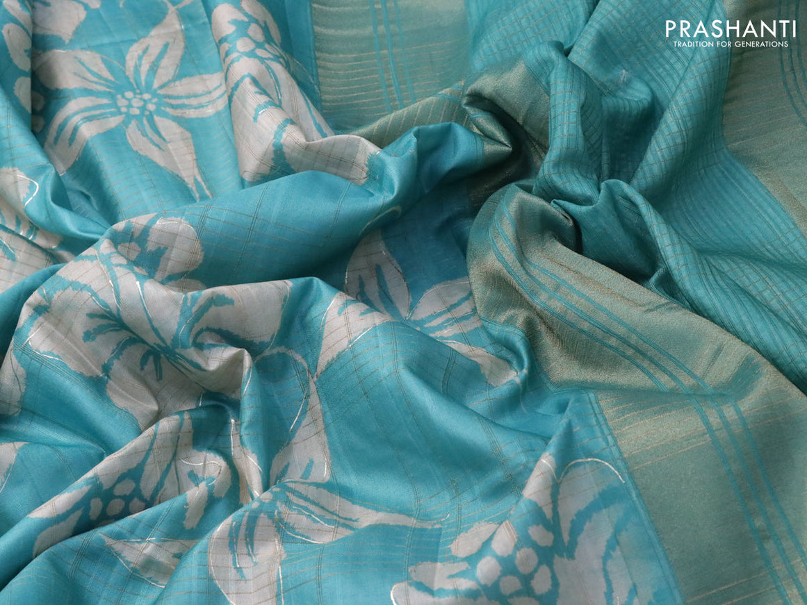 Semi matka foil printed saree teal blue with allover floral prints & zari weaves and zari woven border