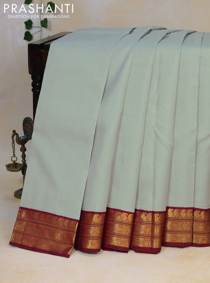 Pure kanjivaram silk saree grey shade and maroon with allover zari wevaes and zari woven border