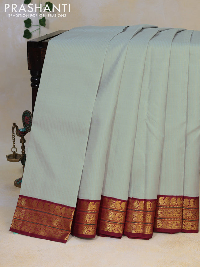 Pure kanjivaram silk saree grey shade and maroon with allover zari wevaes and zari woven border