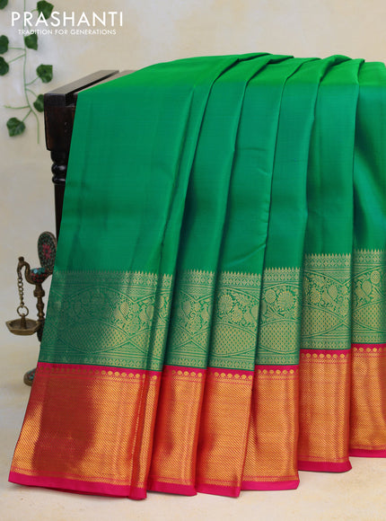 Pure kanjivaram silk saree green and pink with plain body and zari woven border