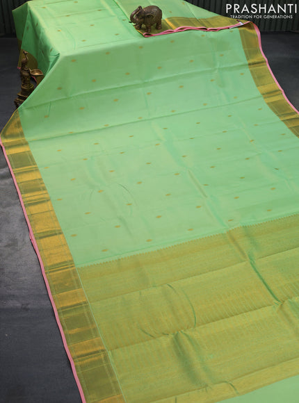 Pure kanjivaram silk saree teal green and peach pink with zari woven buttas and zari woven border