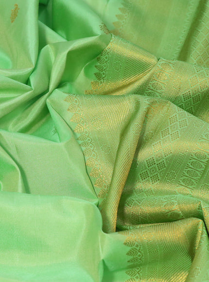 Pure kanjivaram silk saree teal green and peach pink with zari woven buttas and zari woven border