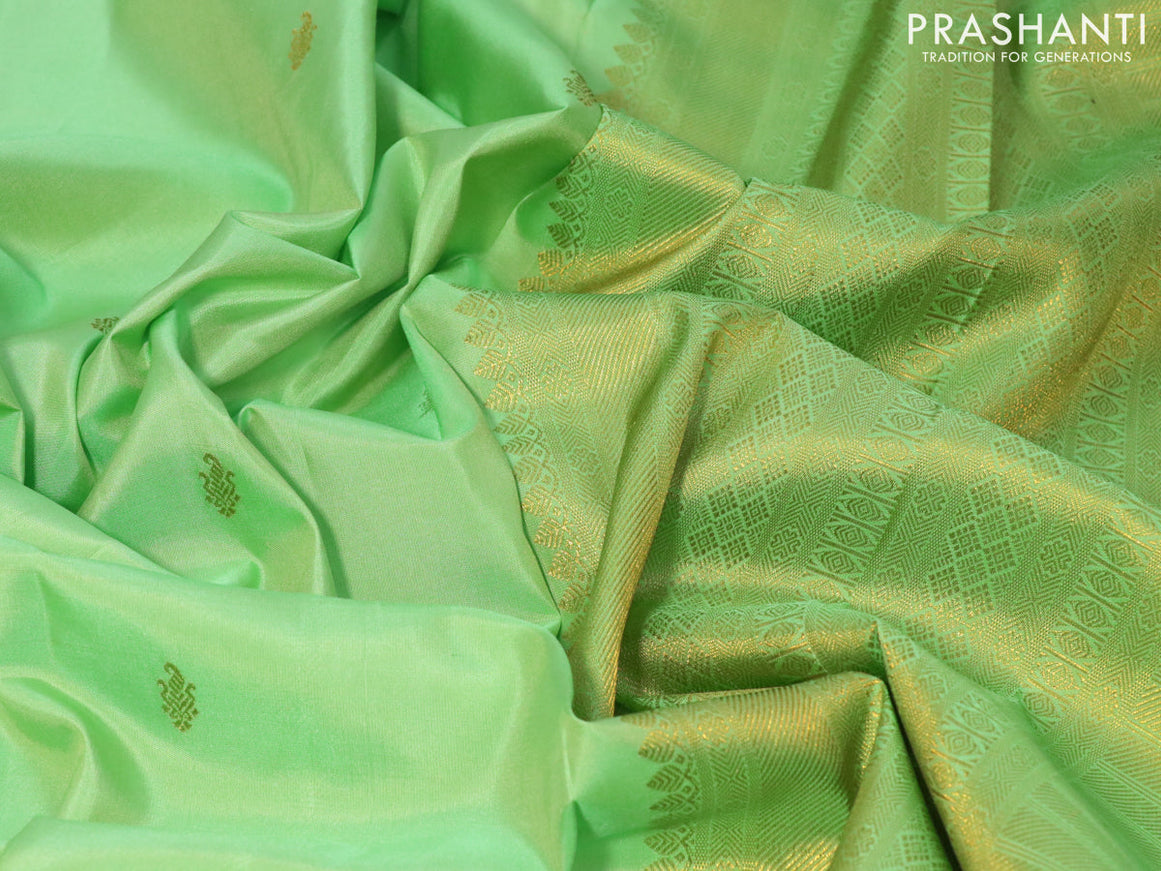 Pure kanjivaram silk saree teal green and peach pink with zari woven buttas and zari woven border