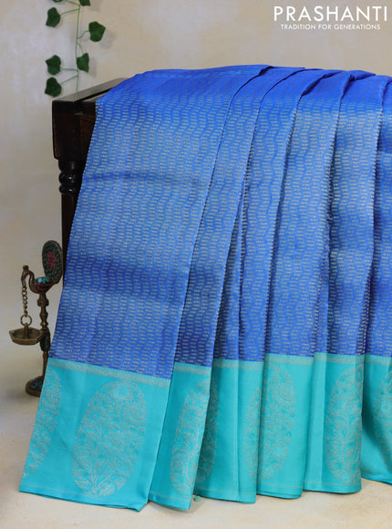 Pure kanjivaram silk saree blue and teal blue shade with allover silver zari woven brocade weaves and silver zari woven border